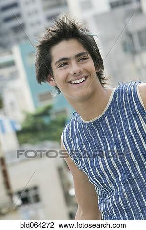Hispanic teenager with eyebrow piercing View Large Photo Image Stock Image - Hispanic teenager with eyebrow piercing. Fotosearch