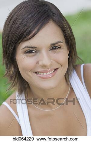 Stock Photo - Hispanic woman smiling. Fotosearch