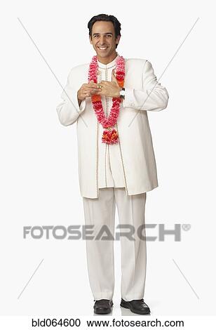 Stock Image - Middle Eastern man in wedding clothing. Fotosearch