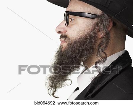 Stock Image - Profile of serious Jewish rabbi. Fotosearch