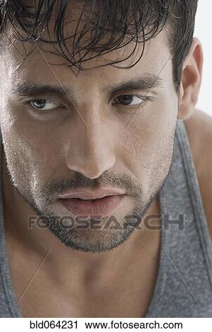 Stock Image - Sad Hispanic man. Fotosearch