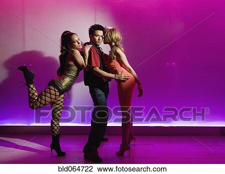 Silhouette of dancers dancing in nightclub View Large Photo Image Stock Image - Silhouette of dancers dancing in nightclub. Fotosearch
