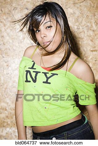 Teenage girl in I love ny t-shirt View Large Photo Image Stock Photo - Teenage girl in I love ny t-shirt. Fotosearch