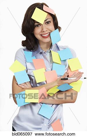 Stock Photo - Woman covered in sticky notes. Fotosearch