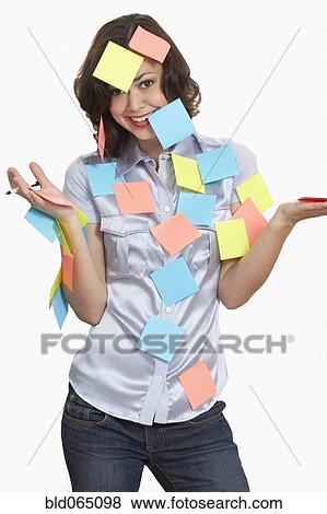 Stock Photo - Woman covered in sticky notes. Fotosearch