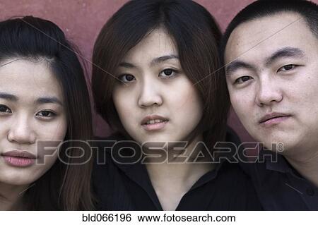 Stock Photograph - Close up of Chinese friends. Fotosearch