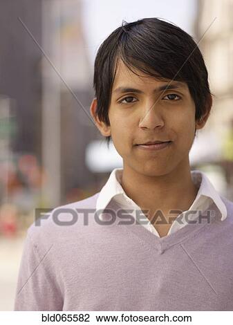 Stock Image - Close up of confident Indian man. Fotosearch