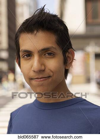 Close up of confident Indian man View Large Photo Image Stock Photo - Close up of confident Indian man. Fotosearch