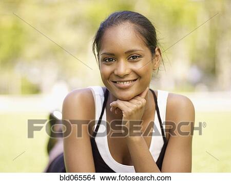 Picture - Close up of confident mixed race woman. Fotosearch
