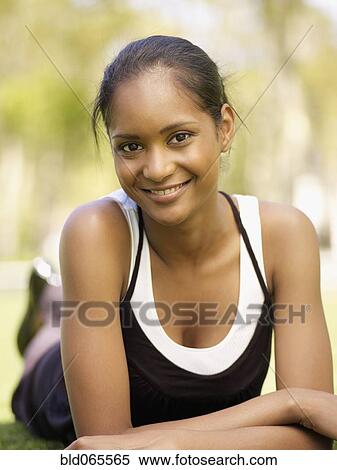 Stock Photography - Close up of confident mixed race woman. Fotosearch