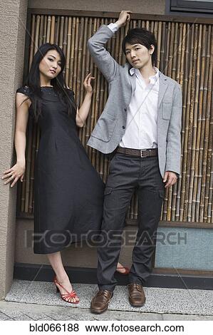 Stock Photo - Japanese couple in fashionable clothing. Fotosearch