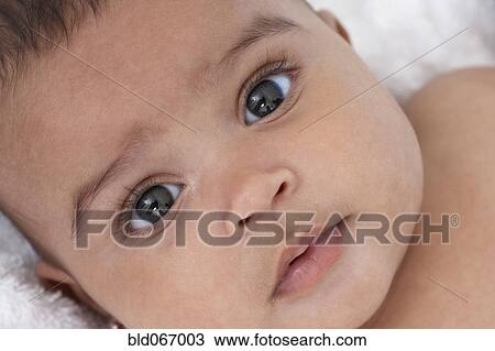 Close up of mixed race baby girl View Large Photo Image Stock Image - Close up of mixed race baby girl. Fotosearch