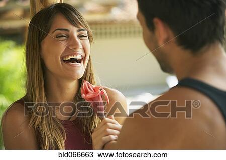 Couple smiling at one another View Large Photo Image Stock Image - Couple smiling at one another. Fotosearch