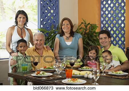 Family enjoying healthy lunch View Large Photo Image Stock Image - Family enjoying healthy lunch. Fotosearch