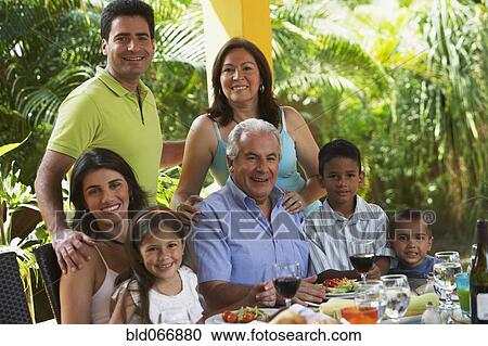 Family enjoying healthy lunch View Large Photo Image Stock Image - Family enjoying healthy lunch. Fotosearch