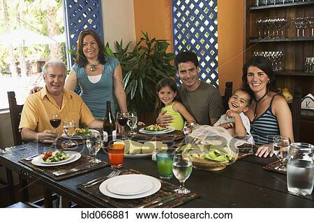 Stock Image - Family enjoying healthy lunch. Fotosearch