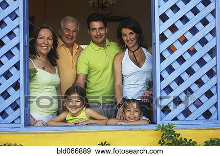 Family looking out window View Large Photo Image Stock Photo - Family looking out window. Fotosearch