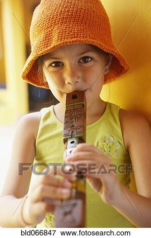 Stock Photo - Girl playing recorder. Fotosearch