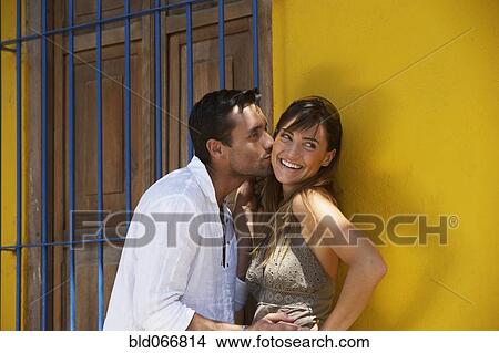 Happy couple kissing View Large Photo Image Picture - Happy couple kissing. Fotosearch