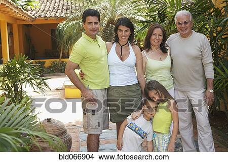 Multi-generational family standing outdoors View Large Photo Image Picture - Multi-generational family standing outdoors. Fotosearch