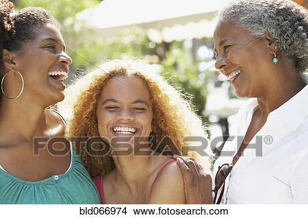 Picture - Multi-generational women laughing. Fotosearch