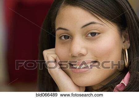 Portrait of African girl smiling View Large Photo Image Stock Photo - Portrait of African girl smiling. Fotosearch