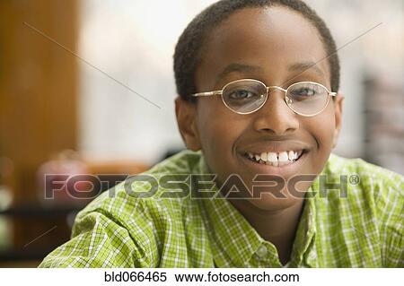 Stock Photography - Portrait of African school boy. Fotosearch