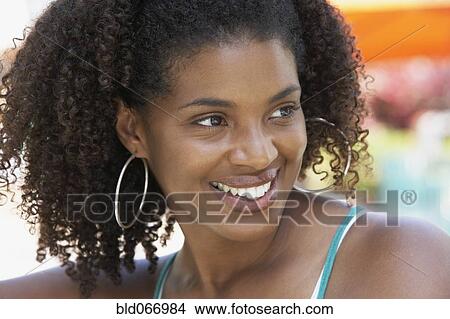 Picture - Portrait of African woman smiling. Fotosearch