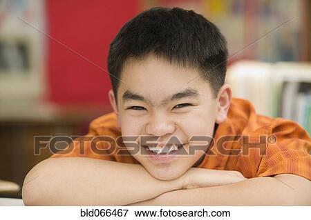 Stock Photo - Portrait of Asian school boy. Fotosearch