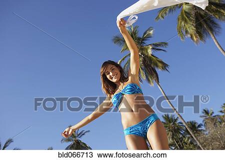 Smiling woman at beach View Large Photo Image Stock Image - Smiling woman at beach. Fotosearch