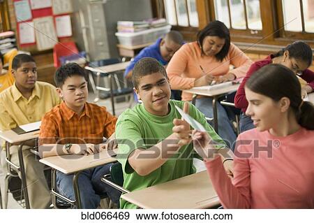 Students distributing name cards in class View Large Photo Image Stock Photo - Students distributing name cards in class. Fotosearch