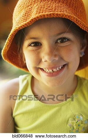 Young girl smiling View Large Photo Image Stock Photo - Young girl smiling . Fotosearch
