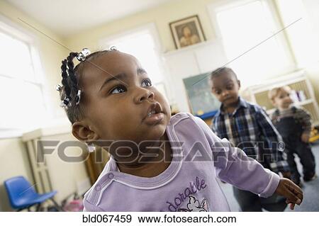 African children playing in day care center View Large Photo Image Stock Photo - African children playing in day care center. Fotosearch