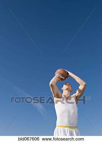 African man playing basketball View Large Photo Image Stock Photograph - African man playing basketball. Fotosearch