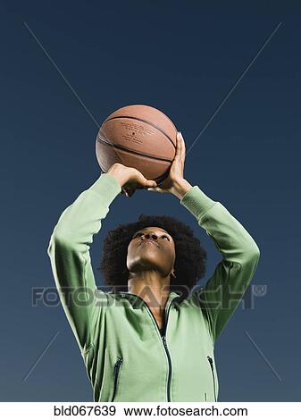 African woman playing basketball View Large Photo Image Stock Photo - African woman playing basketball. Fotosearch