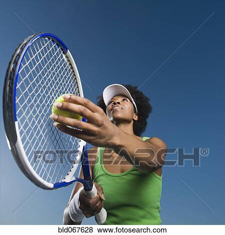 African woman playing tennis View Large Photo Image Stock Photo - African woman playing tennis. Fotosearch