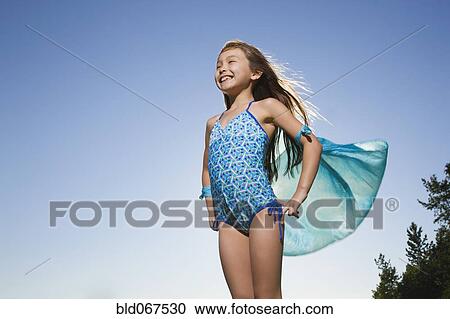 Asian girl in bathing suit with scarf View Large Photo Image Stock Image - Asian girl in bathing suit with scarf. Fotosearch