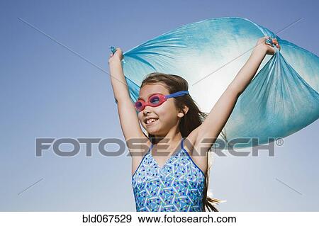 Stock Photo - Asian girl in bathing suit with scarf. Fotosearch
