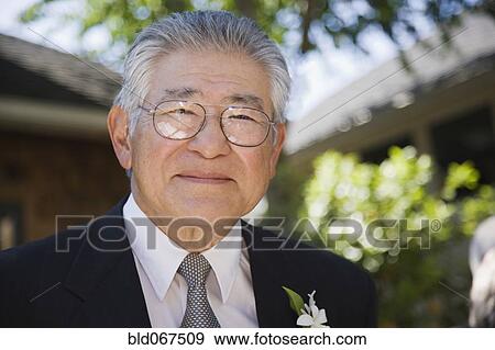 Stock Photo - Senior Asian man smiling. Fotosearch
