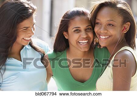 Picture - Teenage friends hanging out together. Fotosearch