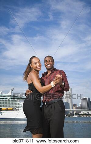Stock Image - African American couple dancing. Fotosearch
