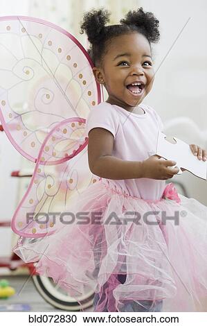 Stock Image - African American girl in fairy costume. Fotosearch