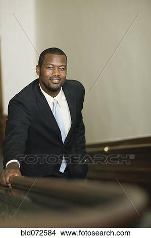 African businessman ascending staircase View Large Photo Image Picture - African businessman ascending staircase. Fotosearch