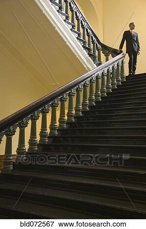 Stock Photo - African businessman in capitol building. Fotosearch