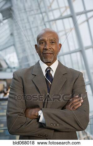 African businessman with arms crossed View Large Photo Image Stock Photo - African businessman with arms crossed. Fotosearch
