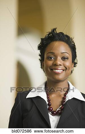 African businesswoman smiling View Large Photo Image Stock Photograph - African businesswoman smiling. Fotosearch