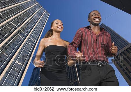 African couple holding hands in urban scene View Large Photo Image Stock Image - African couple holding hands in urban scene. Fotosearch