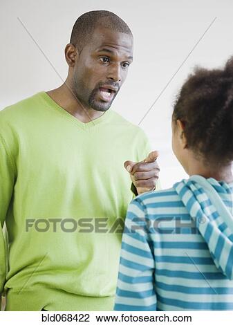 African father scolding daughter View Large Photo Image Stock Image - African father scolding daughter. Fotosearch