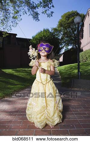 Stock Image - African girl in fairy princess costume. Fotosearch