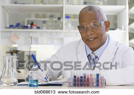 African scientist performing analysis in laboratory View Large Photo Image Stock Image - African scientist performing analysis in laboratory. Fotosearch